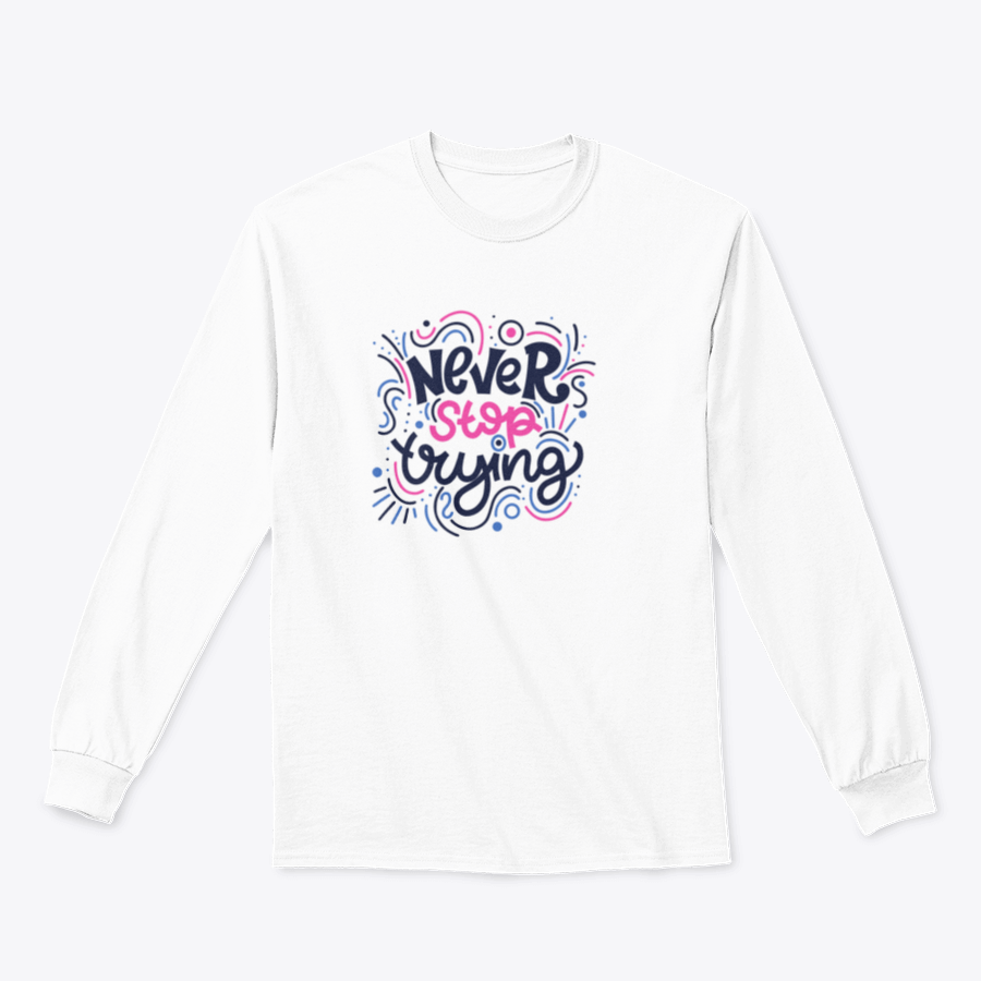 A vibrant t-shirt featuring the motivational phrase 'Never Stop Trying' in bright colored letters, showcasing a modern hand-drawn design.