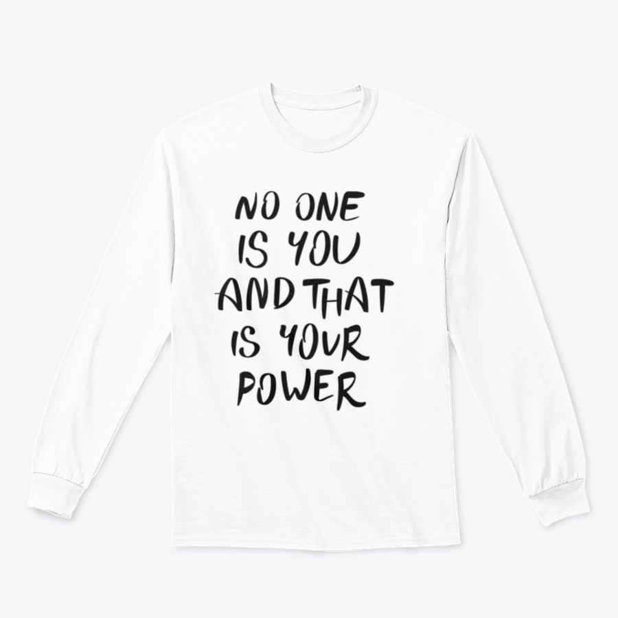 A stylish t-shirt featuring the hand-written calligraphy quote 'No One Is You And That Is Your Power' on a soft cotton fabric.