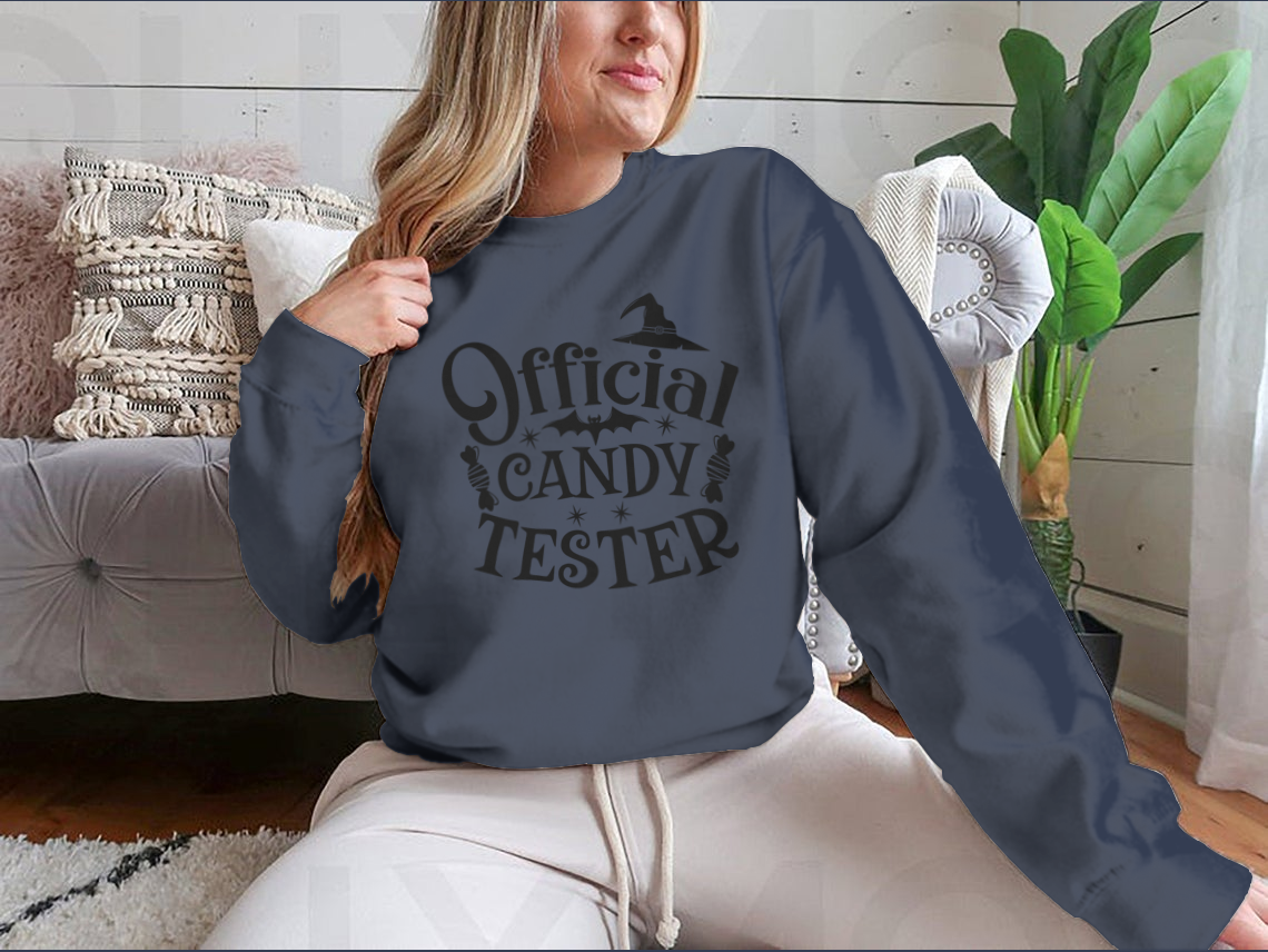 Official Candy Tester Vector Halloween Sweatshirt featuring a fun design, made from 100% cotton for comfort.