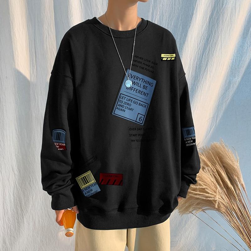 Oversized Punk Pullover by Lance Donovan featuring patchwork design, O-neck collar, and full sleeves in a casual style.