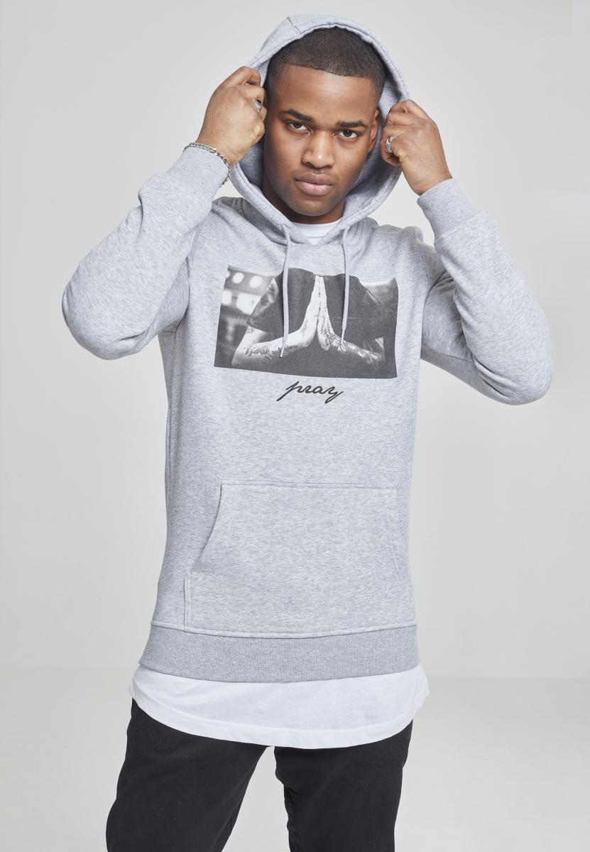 A stylish Pray Hoodie featuring a bold print, made from soft brushed fleece fabric in a comfortable fit.