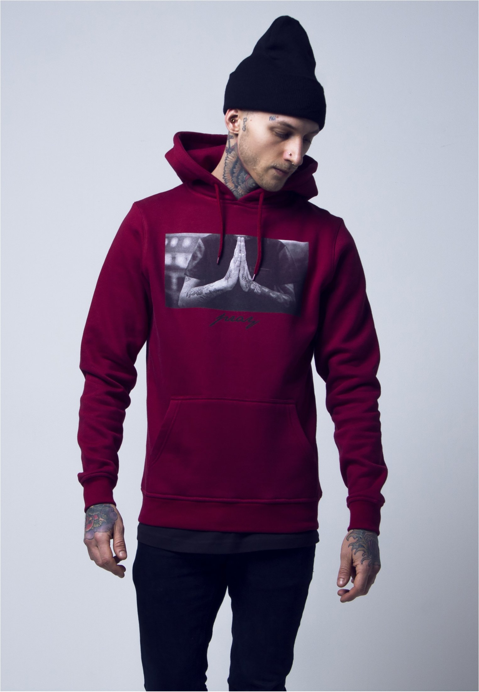 A stylish Pray Hoodie featuring a bold print, made from soft brushed fleece fabric in a comfortable fit.