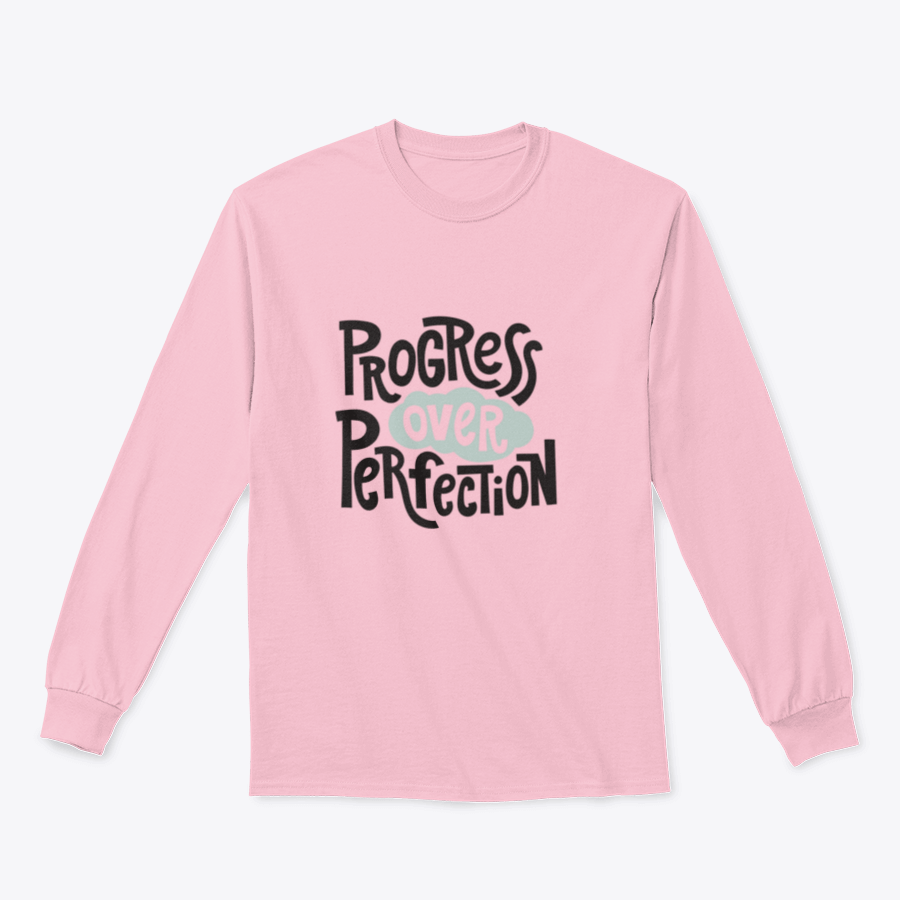 A stylish t-shirt featuring the inspirational quote 'Progress Over Perfection' in a unique design, made from soft cotton fabric.