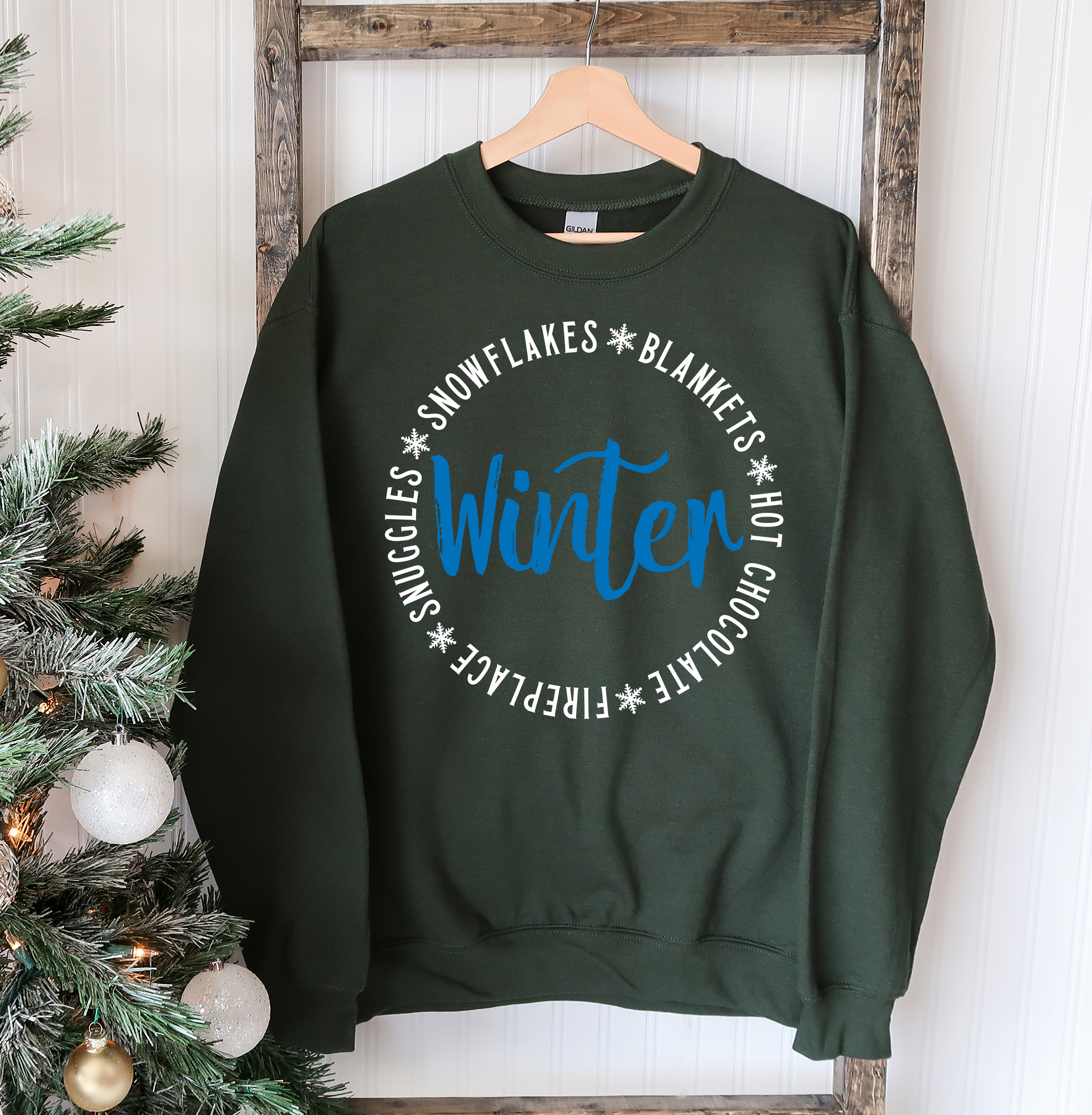 Cozy unisex Snowflakes Blankets Winter Sweatshirt in soft fabric, featuring a crew neck and rib-knit collar, perfect for winter wear.