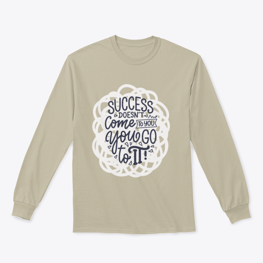 A stylish modern calligraphy design featuring the phrase 'Success Doesn't Come To You, You Go To It' on a comfortable cotton garment.