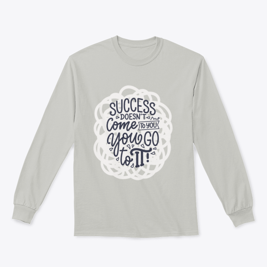 A stylish modern calligraphy design featuring the phrase 'Success Doesn't Come To You, You Go To It' on a comfortable cotton garment.