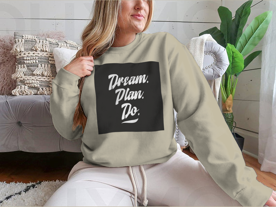 A cozy sweatshirt featuring an inspirational quote, showcasing high-quality cotton fabric and a classic fit.