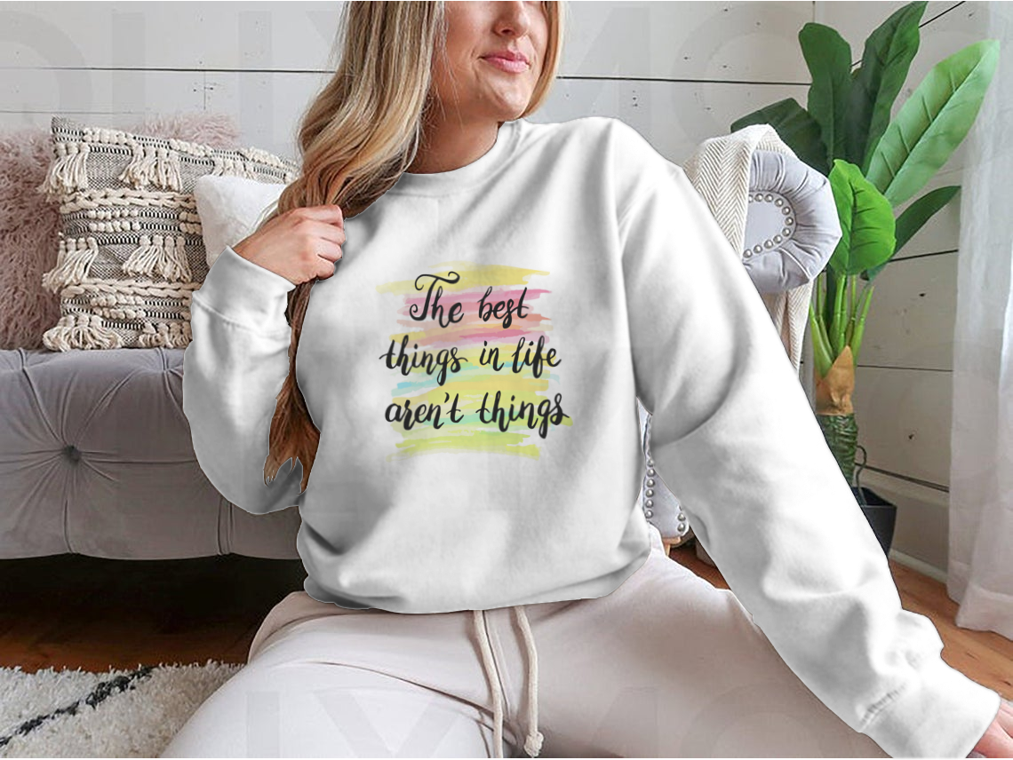 A stylish t-shirt featuring the inspirational quote 'The Best Things In Life Are Not Things' designed for comfort and motivation.