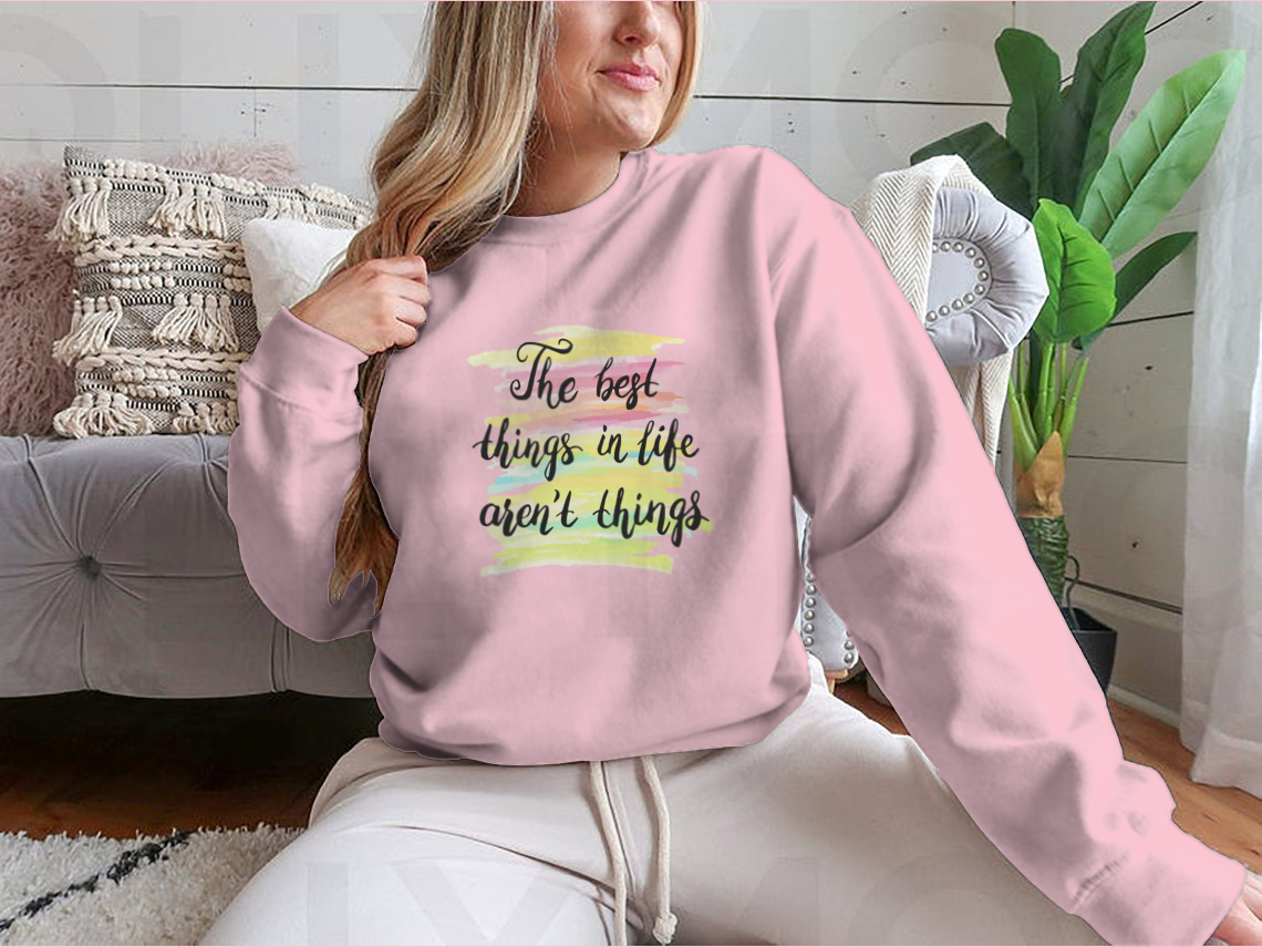 A stylish t-shirt featuring the inspirational quote 'The Best Things In Life Are Not Things' designed for comfort and motivation.