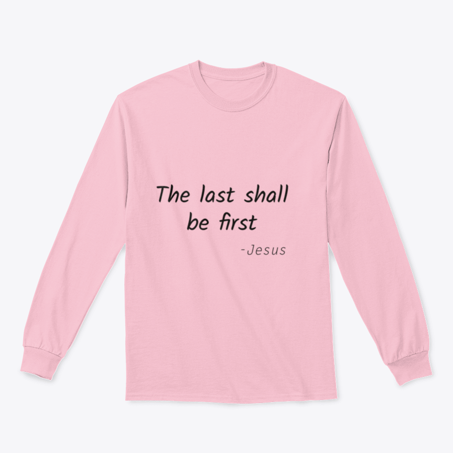 A stylish typography print featuring the phrase 'The Last Shall Be First' on a soft cotton fabric, showcasing its classic fit and midweight design.