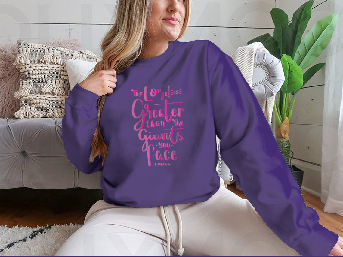 Woman wearing purple inspirational sweatshirt