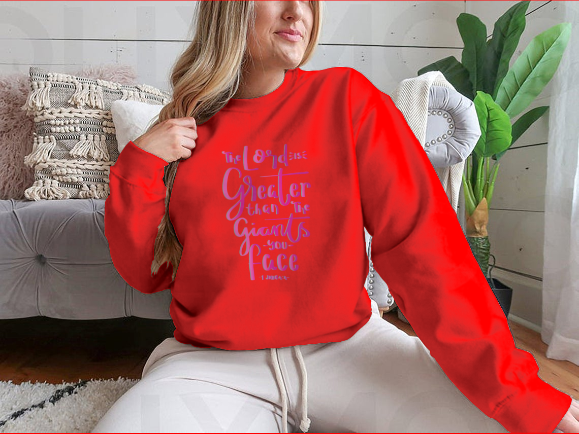 Woman wearing a red motivational sweatshirt.