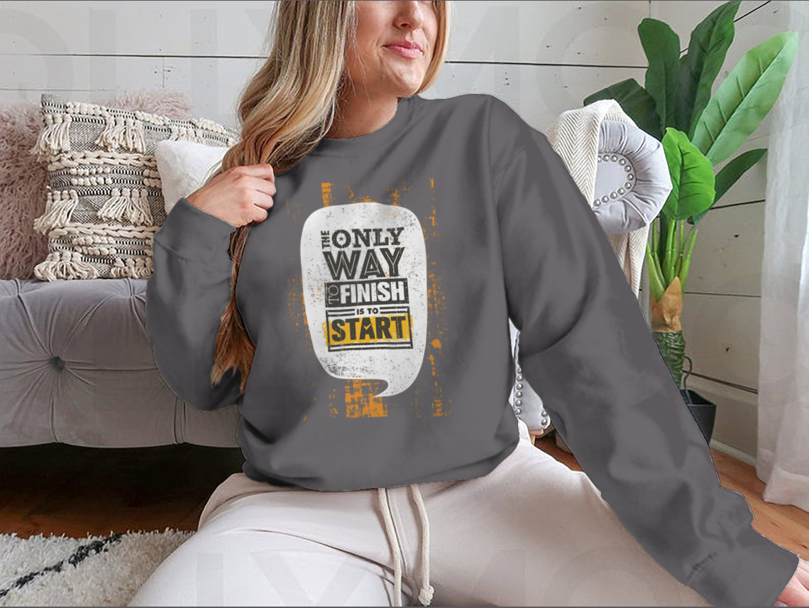 A stylish sweatshirt featuring the motivational phrase 'The Only Way To Finish Is To Start', made from a comfortable cotton/polyester blend.