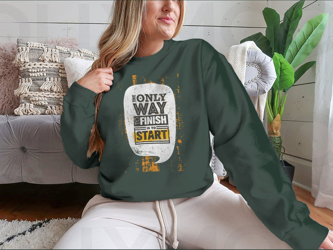 A stylish sweatshirt featuring the motivational phrase 'The Only Way To Finish Is To Start', made from a comfortable cotton/polyester blend.