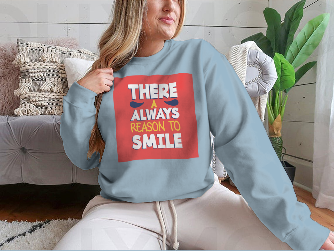 A stylish t-shirt featuring the phrase 'There’s Always a Reason to Smile', showcasing a classic fit and soft fabric.