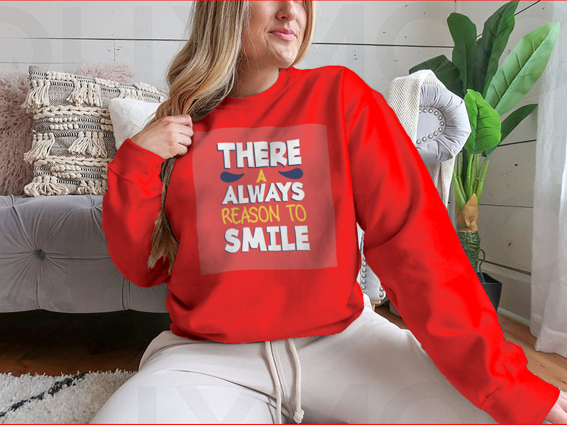 A stylish t-shirt featuring the phrase 'There’s Always a Reason to Smile', showcasing a classic fit and soft fabric.