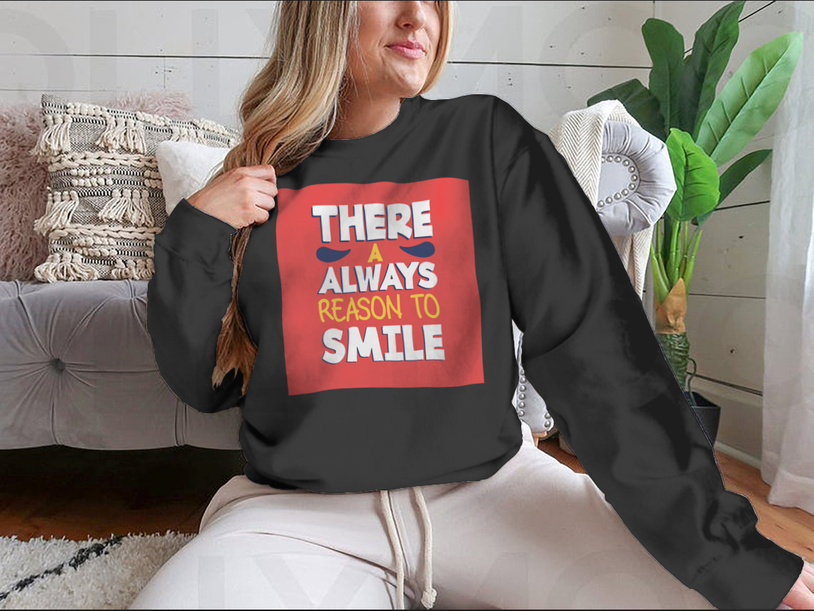 A stylish t-shirt featuring the phrase 'There’s Always a Reason to Smile', showcasing a classic fit and soft fabric.