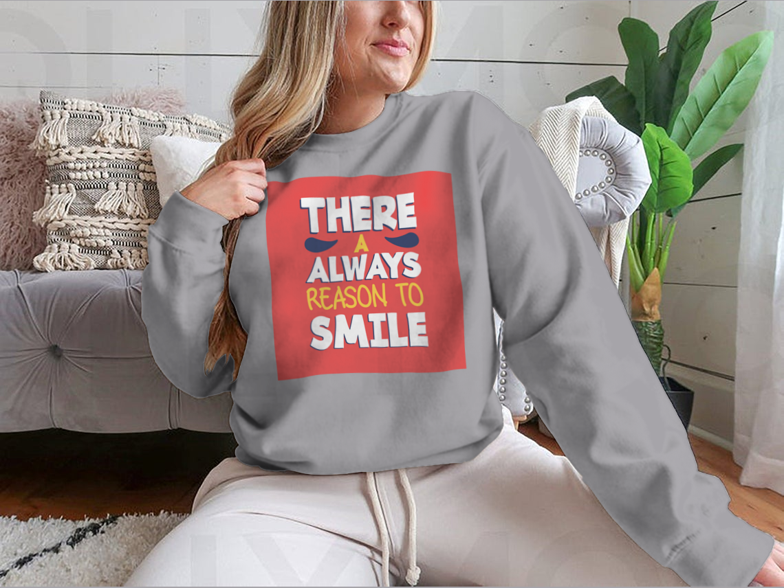 A stylish t-shirt featuring the phrase 'There’s Always a Reason to Smile', showcasing a classic fit and soft fabric.