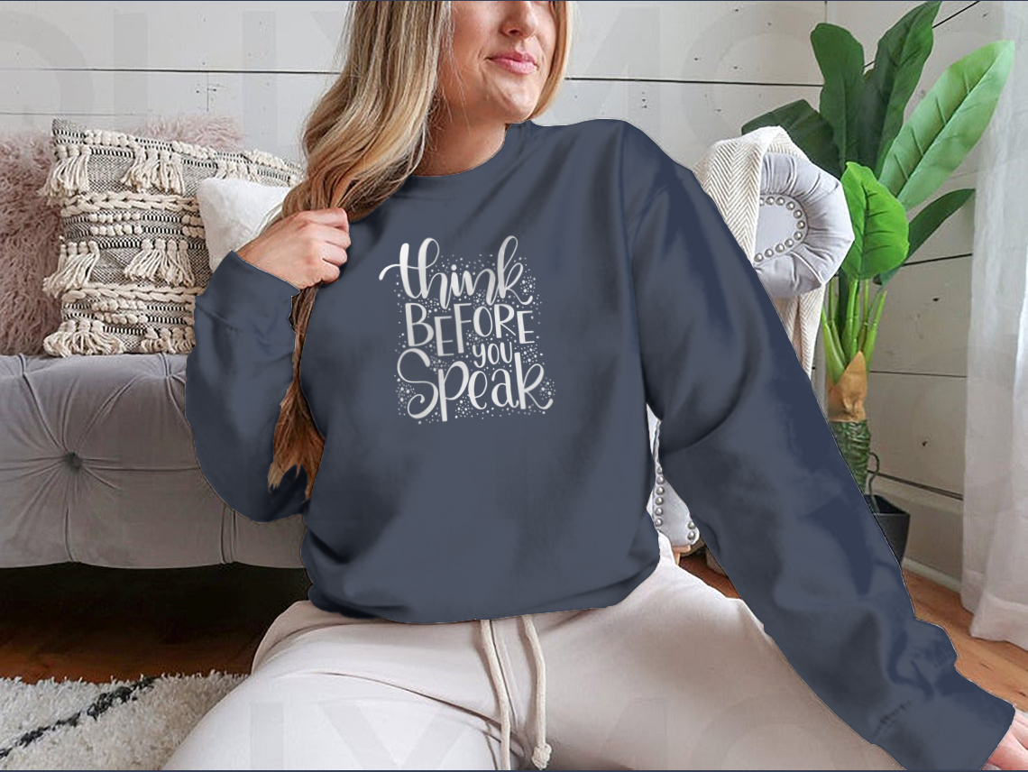 A stylish grey shirt featuring hand lettering of motivational quotes, made from soft cotton fabric, perfect for casual wear.