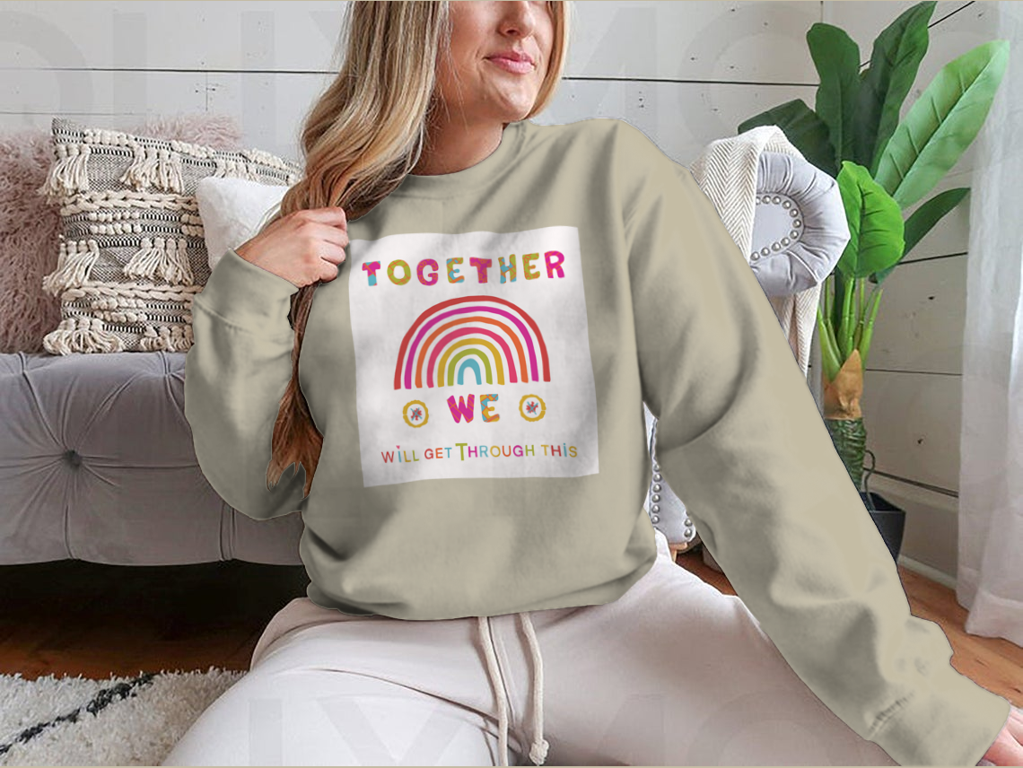 A cozy sweatshirt featuring the inspiring phrase 'Together We Will Get Through This', showcasing a classic fit and soft fabric.