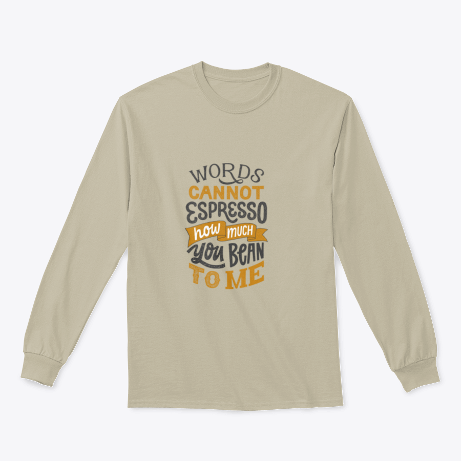 A stylish t-shirt featuring hand-written lettering that says 'Words Cannot Espresso How Much You Bean To Me', perfect for coffee lovers.