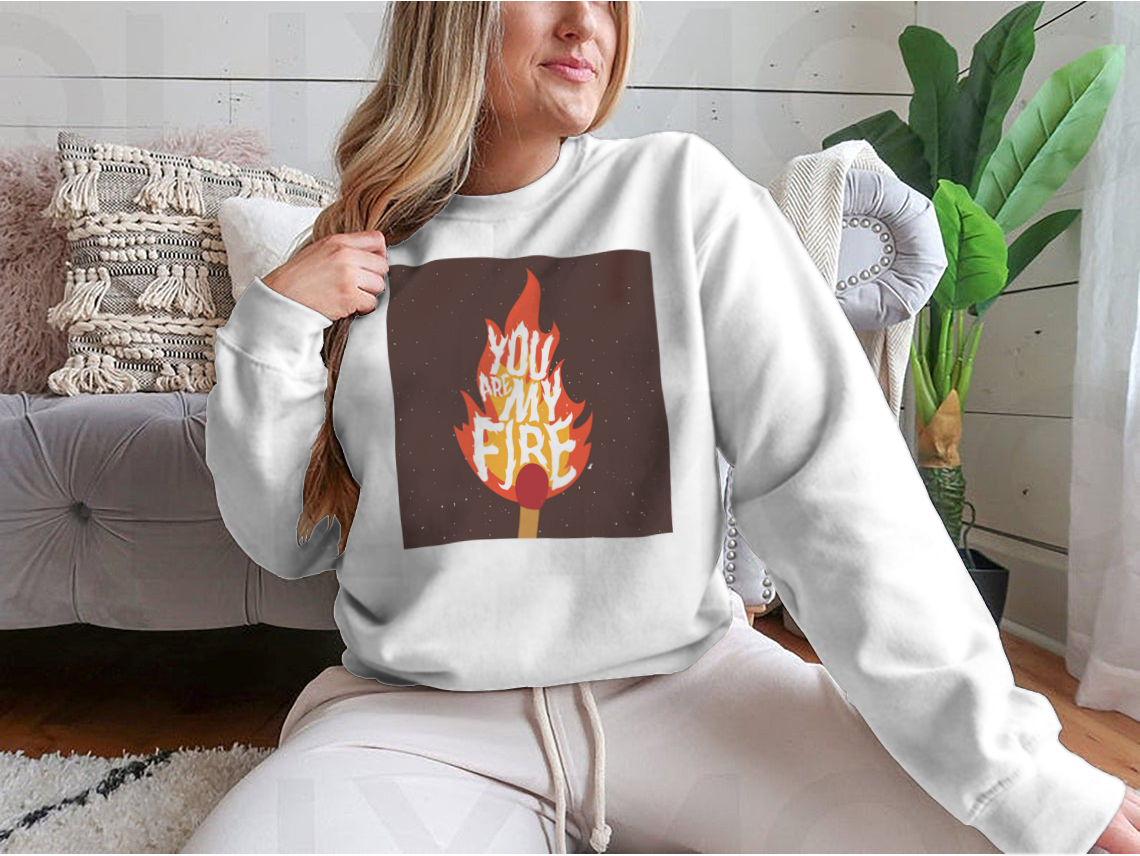 A stylish t-shirt featuring the motivational quote 'You Are My Fire' designed for comfort and inspiration.