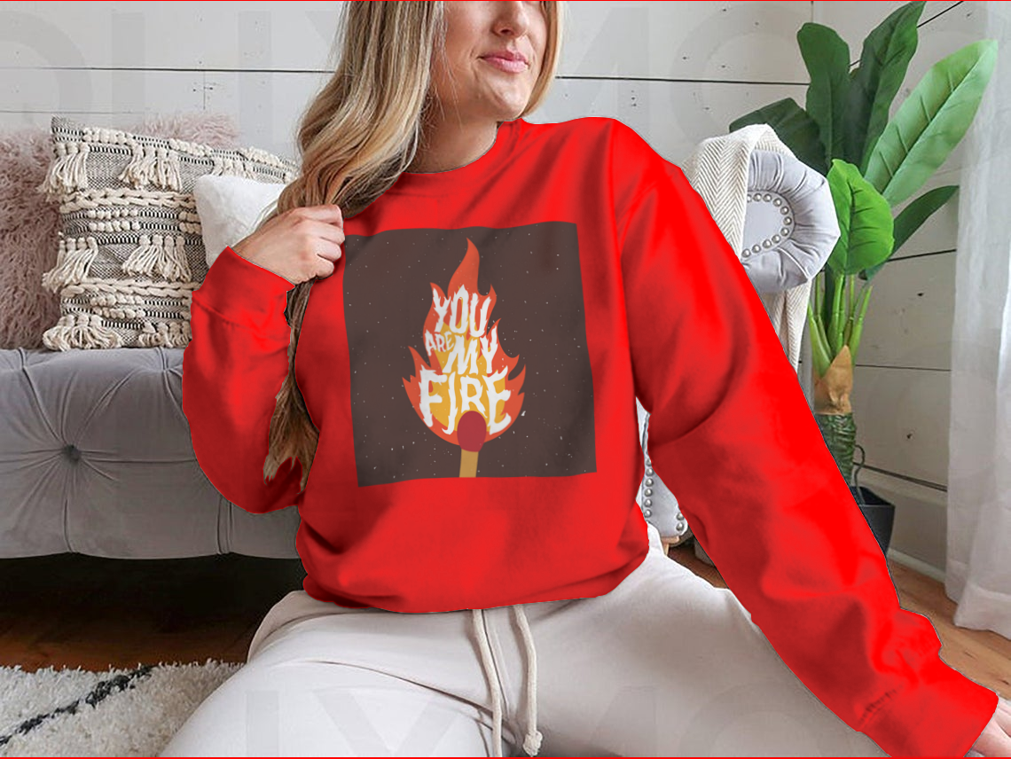 A stylish t-shirt featuring the motivational quote 'You Are My Fire' designed for comfort and inspiration.