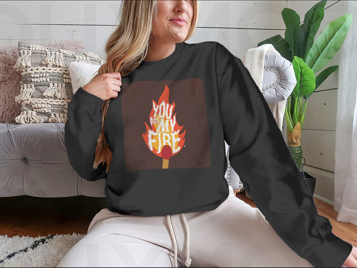 A stylish t-shirt featuring the motivational quote 'You Are My Fire' designed for comfort and inspiration.