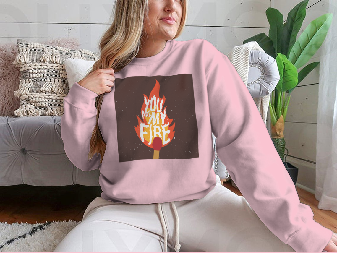 A stylish t-shirt featuring the motivational quote 'You Are My Fire' designed for comfort and inspiration.