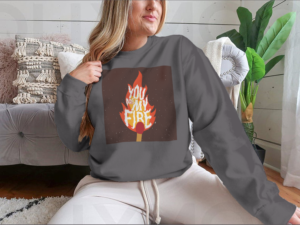 A stylish t-shirt featuring the motivational quote 'You Are My Fire' designed for comfort and inspiration.