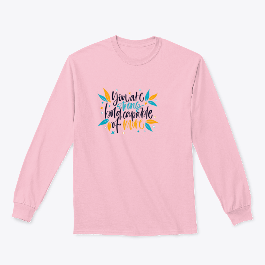 A motivational apparel piece featuring the phrase 'You Are Strong, Bold, Capable Of More' in a stylish design, made from a comfortable cotton-polyester blend.