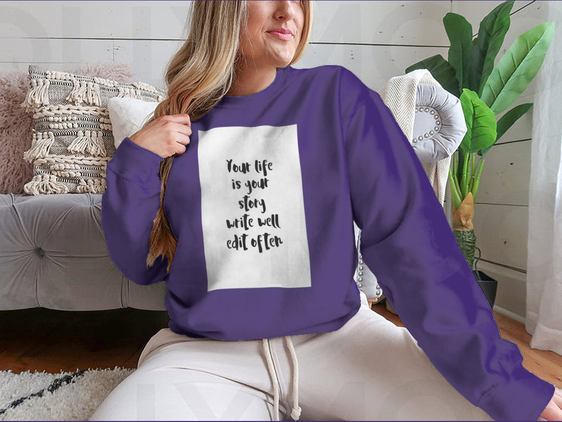 A motivational quote apparel featuring the phrase 'Your Life Is Your Story Write Well Edit Often' on a comfortable cotton/polyester blend fabric.