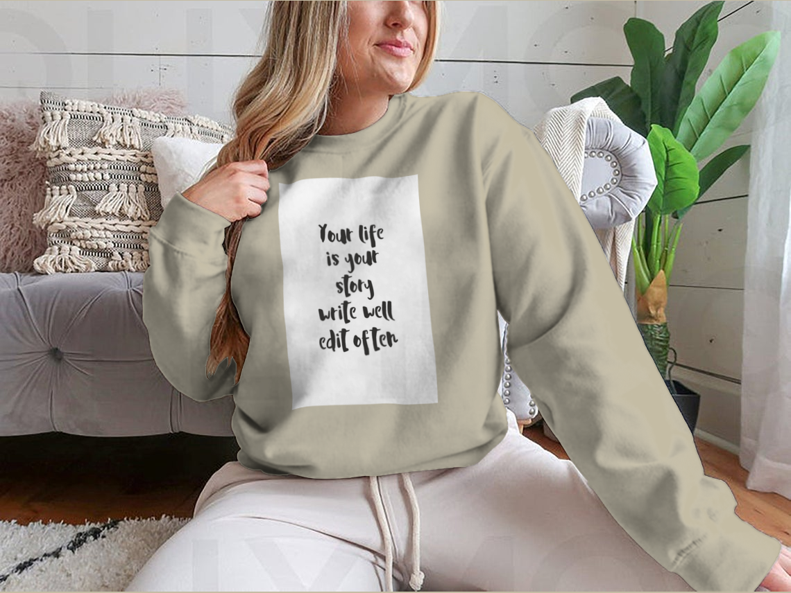 A motivational quote apparel featuring the phrase 'Your Life Is Your Story Write Well Edit Often' on a comfortable cotton/polyester blend fabric.