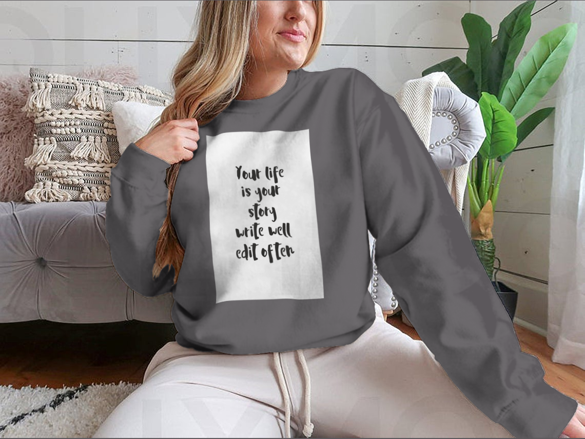 A motivational quote apparel featuring the phrase 'Your Life Is Your Story Write Well Edit Often' on a comfortable cotton/polyester blend fabric.