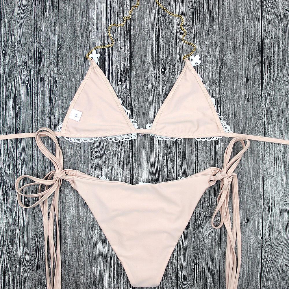 Pink lace-trimmed bikini set.