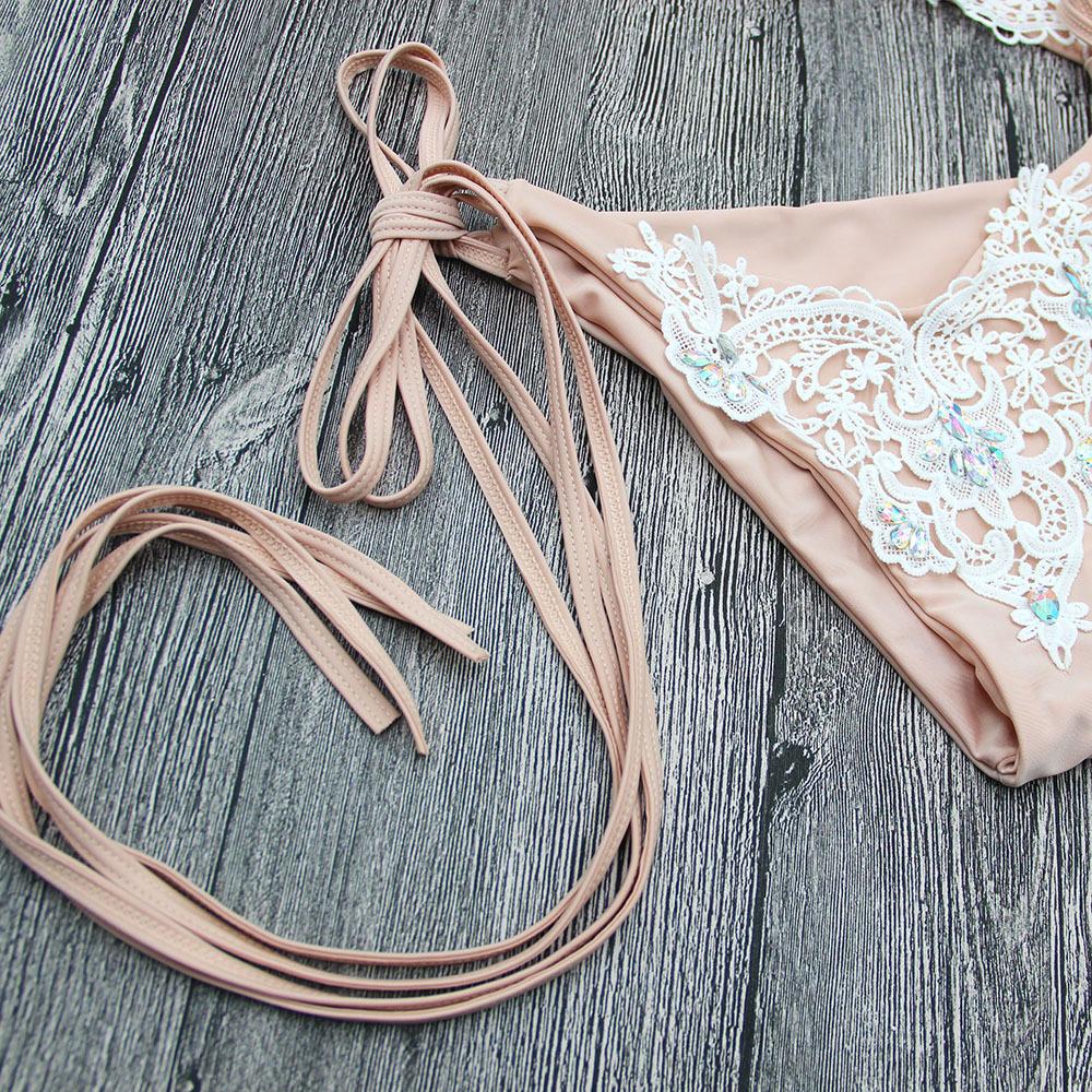 Pink lace lingerie with ties.