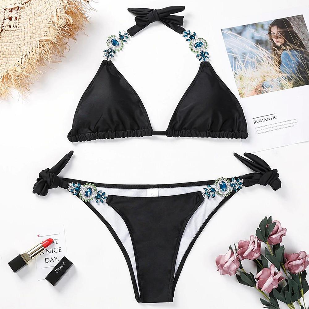 Black bikini with floral embellishments.