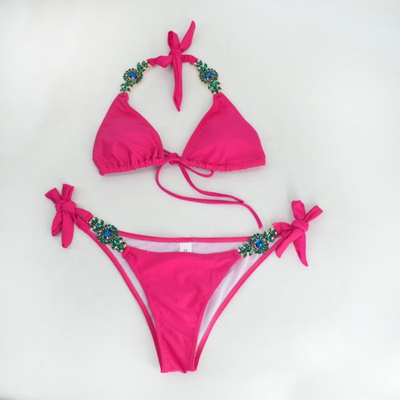 Pink bikini with decorative beads.