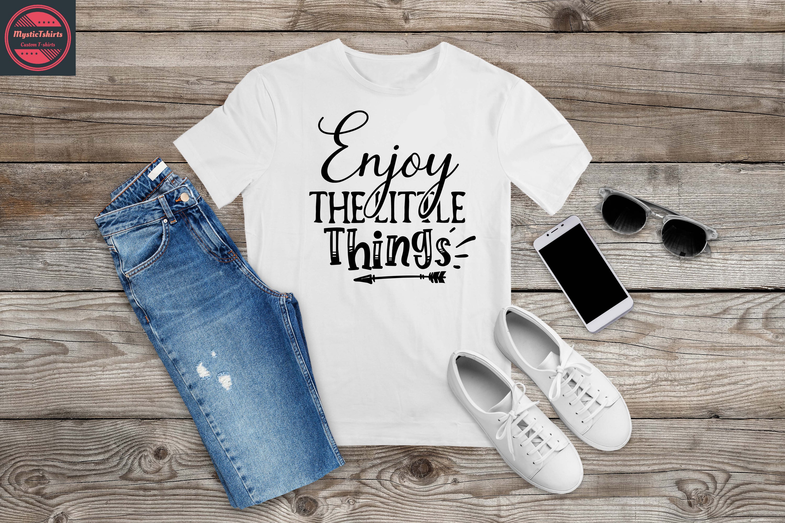 Custom made T-shirt with 'Enjoy the Little Things' design, showcasing vibrant colors and high-quality fabric.