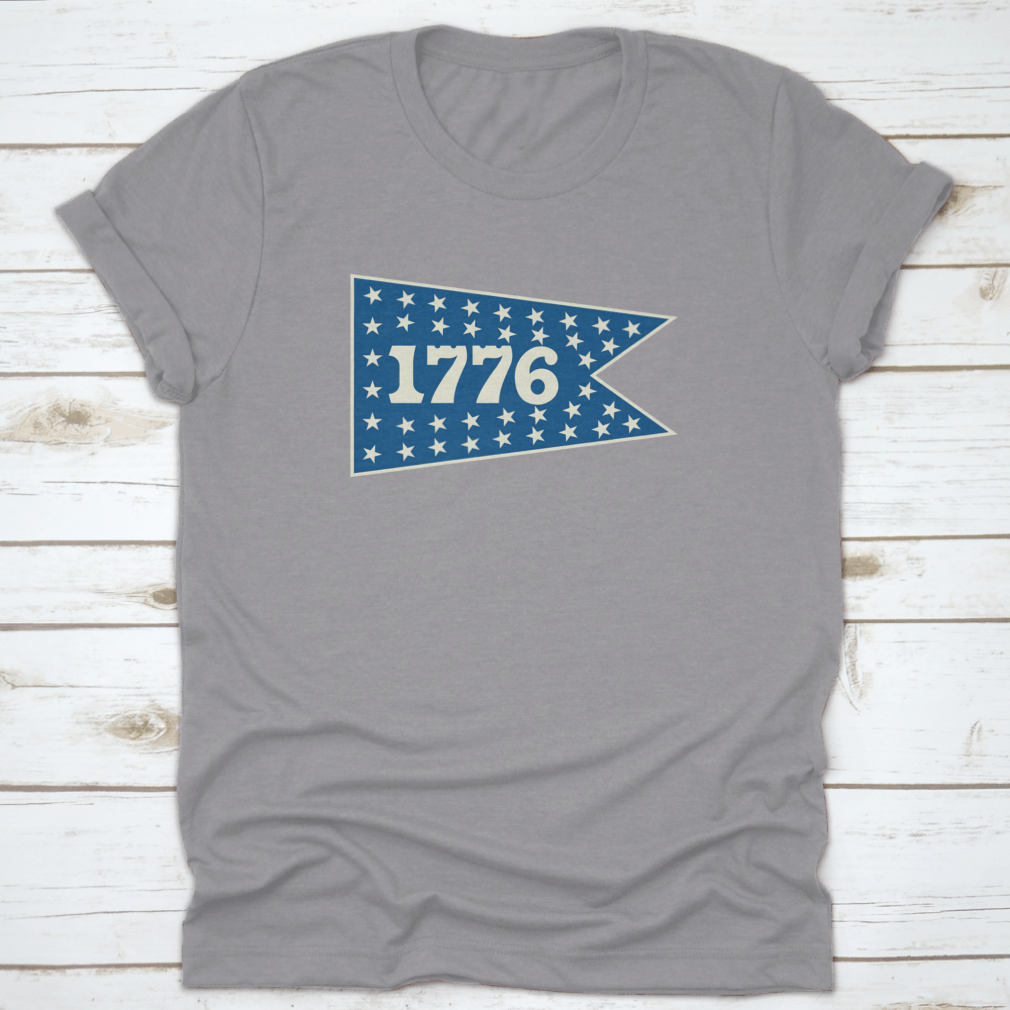 1776 Centennial Banner Pennant shirt featuring a classic fit, made from 100% cotton, ideal for travel and celebrating American history.