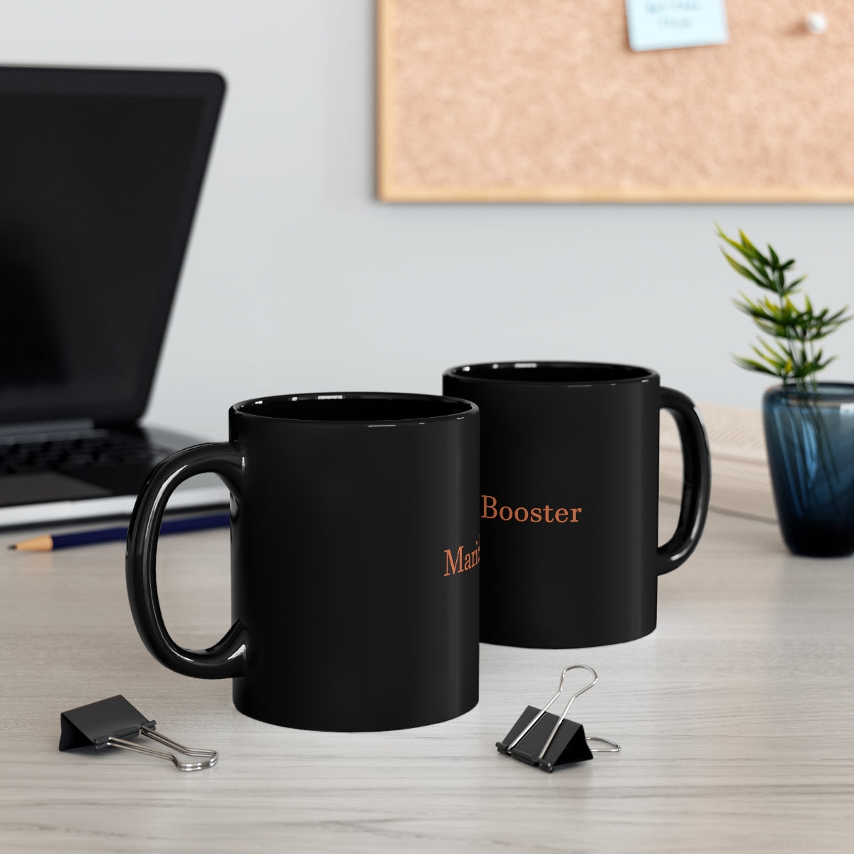 An 11oz black ceramic mug with a C-handle, perfect for coffee, tea, or hot chocolate, showcasing customizable design options.