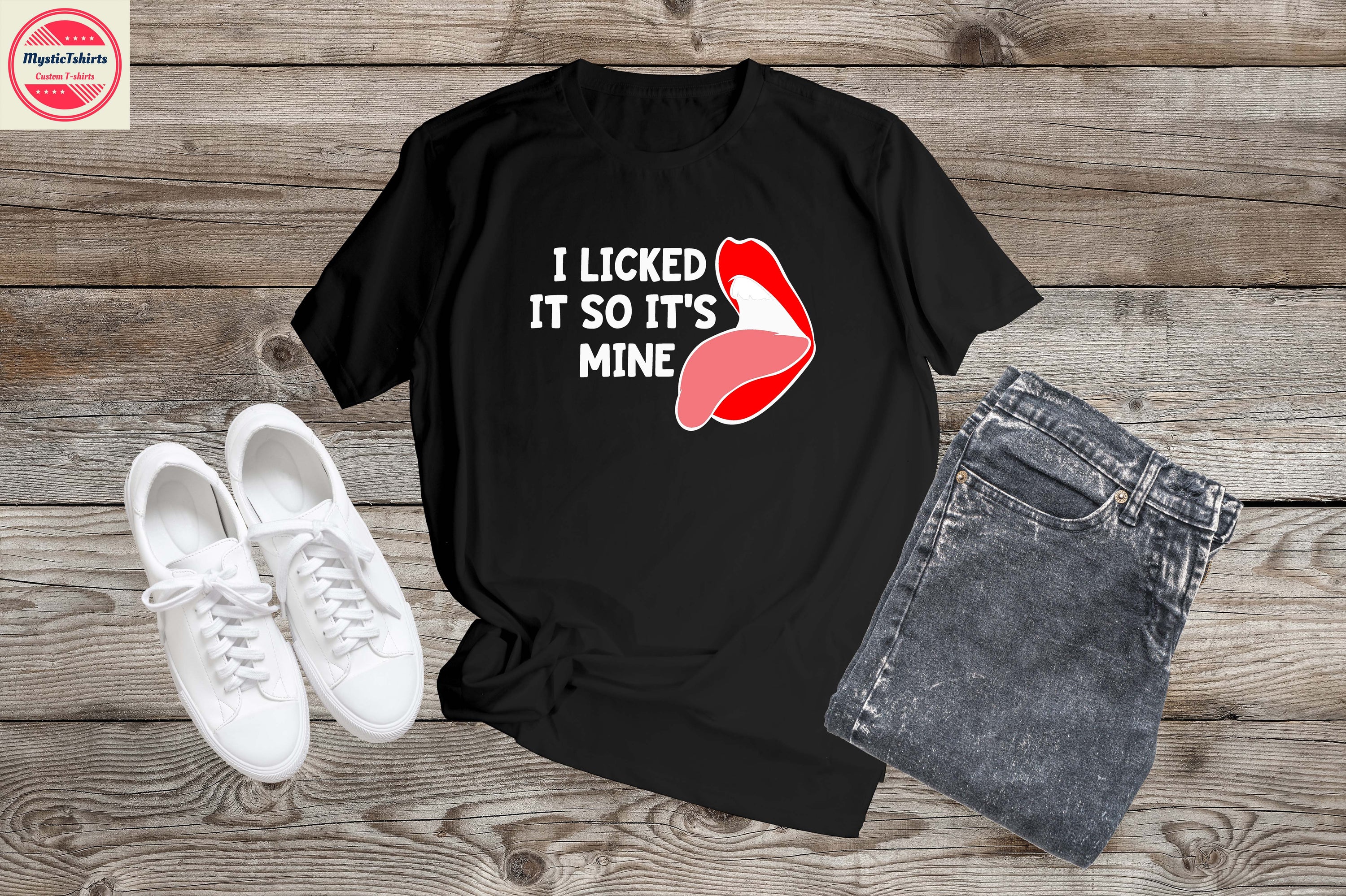 Personalized T-shirt with the phrase 'I LICKED IT SO IT'S MINE', showcasing custom text options and vibrant colors.