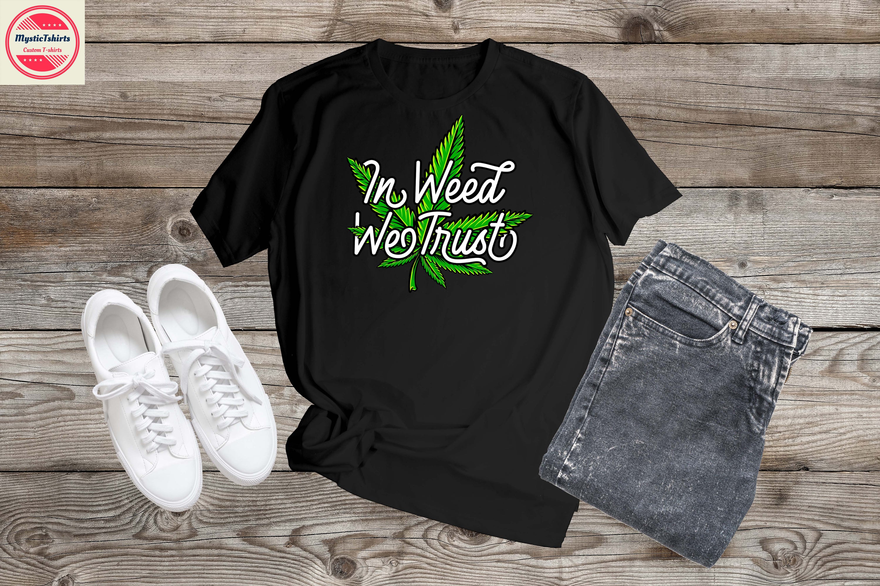 Custom made 'In Weed We Trust' T-shirt featuring vibrant design and high-quality fabric, perfect for personal expression.