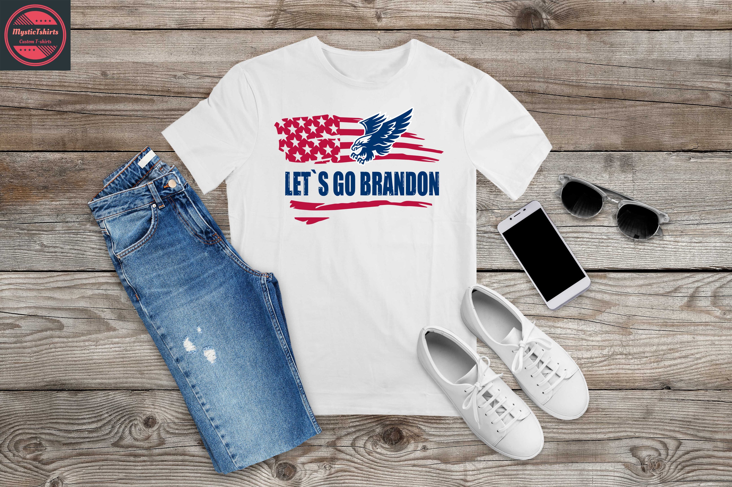 Custom LET'S GO BRANDON T-shirt displayed on a hanger, showcasing vibrant colors and high-quality fabric.