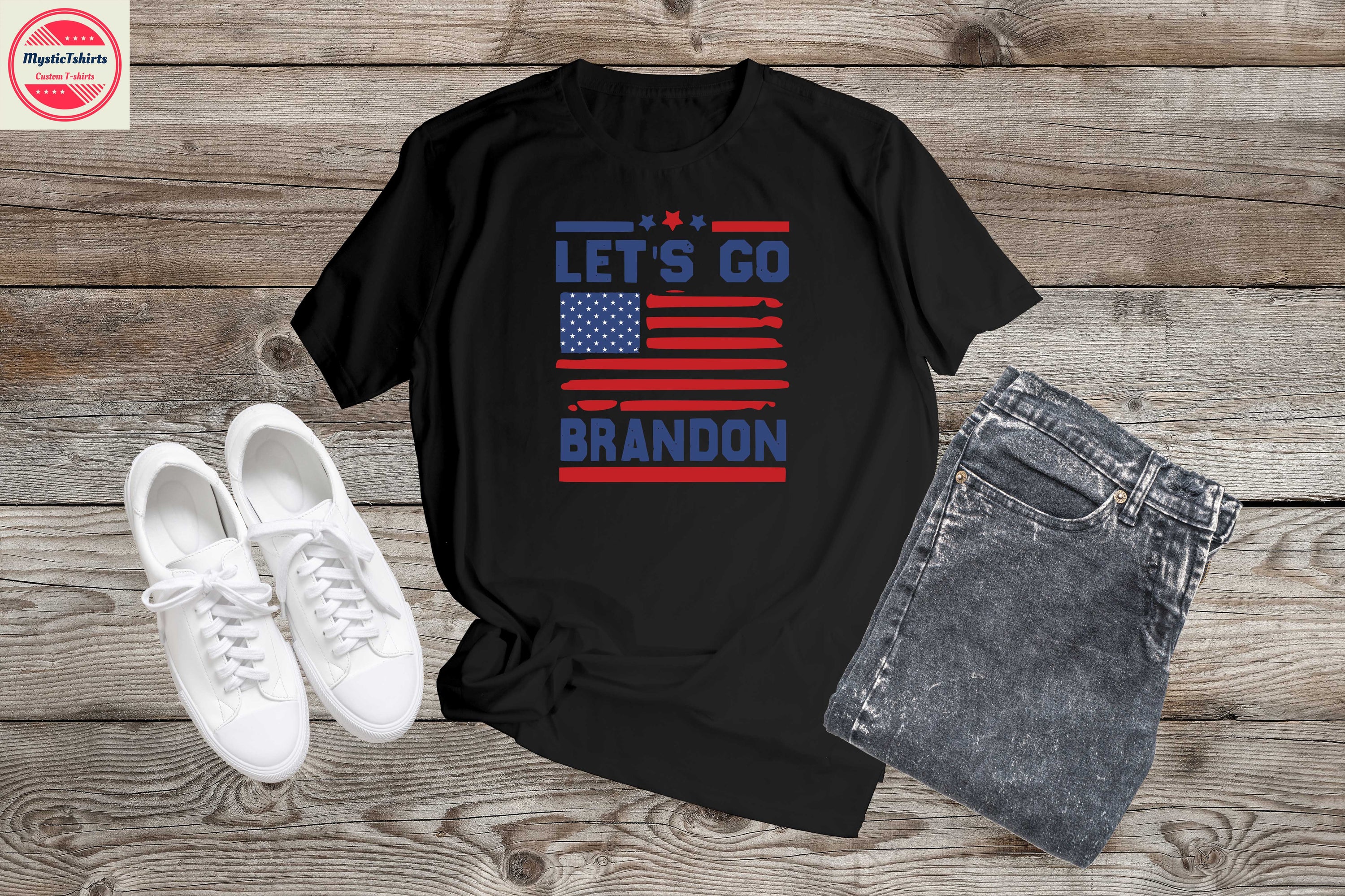 Custom LET'S GO BRANDON T-shirt displayed on a hanger, showcasing vibrant colors and high-quality fabric.