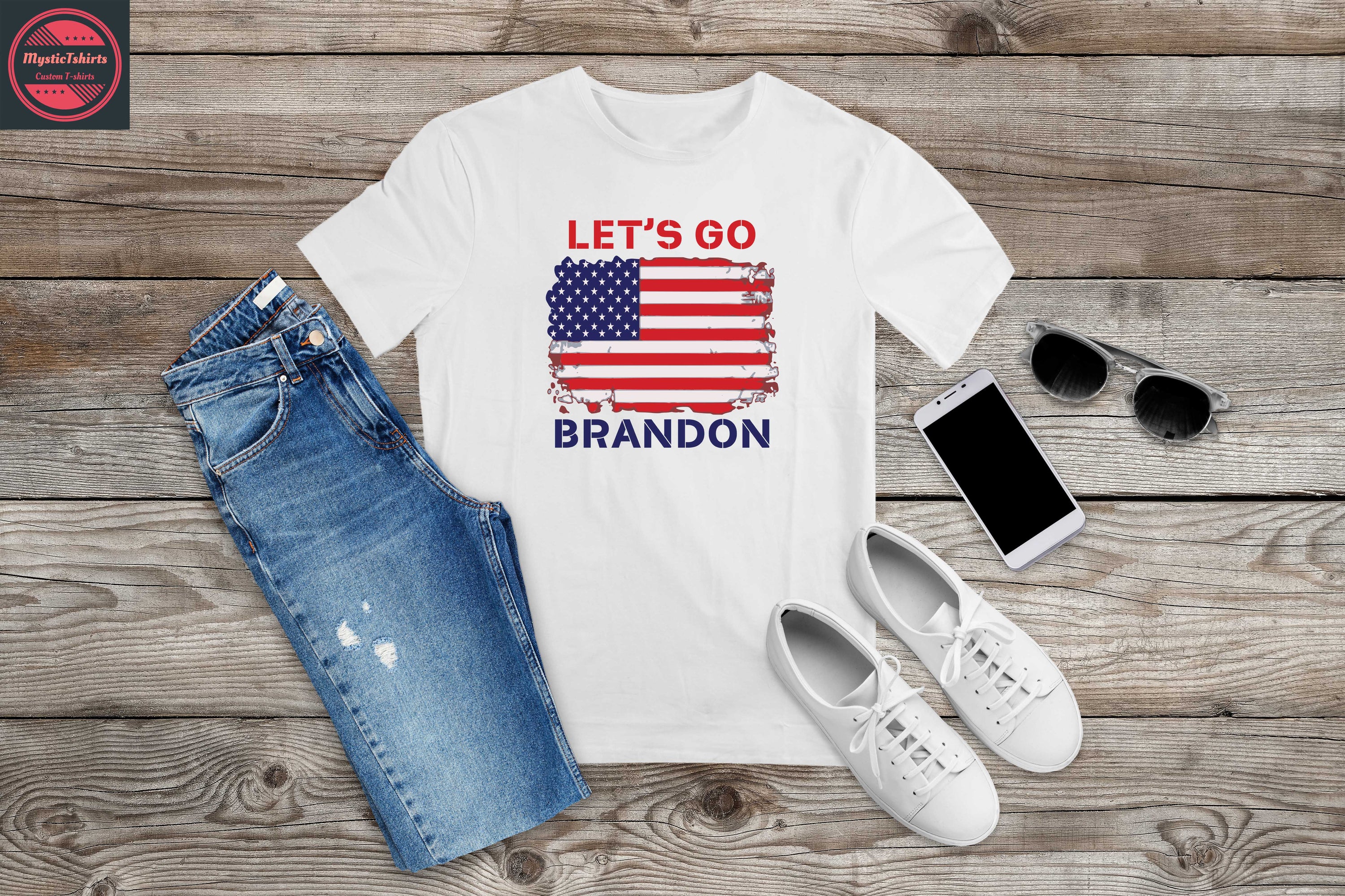 Custom LET'S GO BRANDON T-shirt displayed on a hanger, showcasing vibrant colors and high-quality fabric.