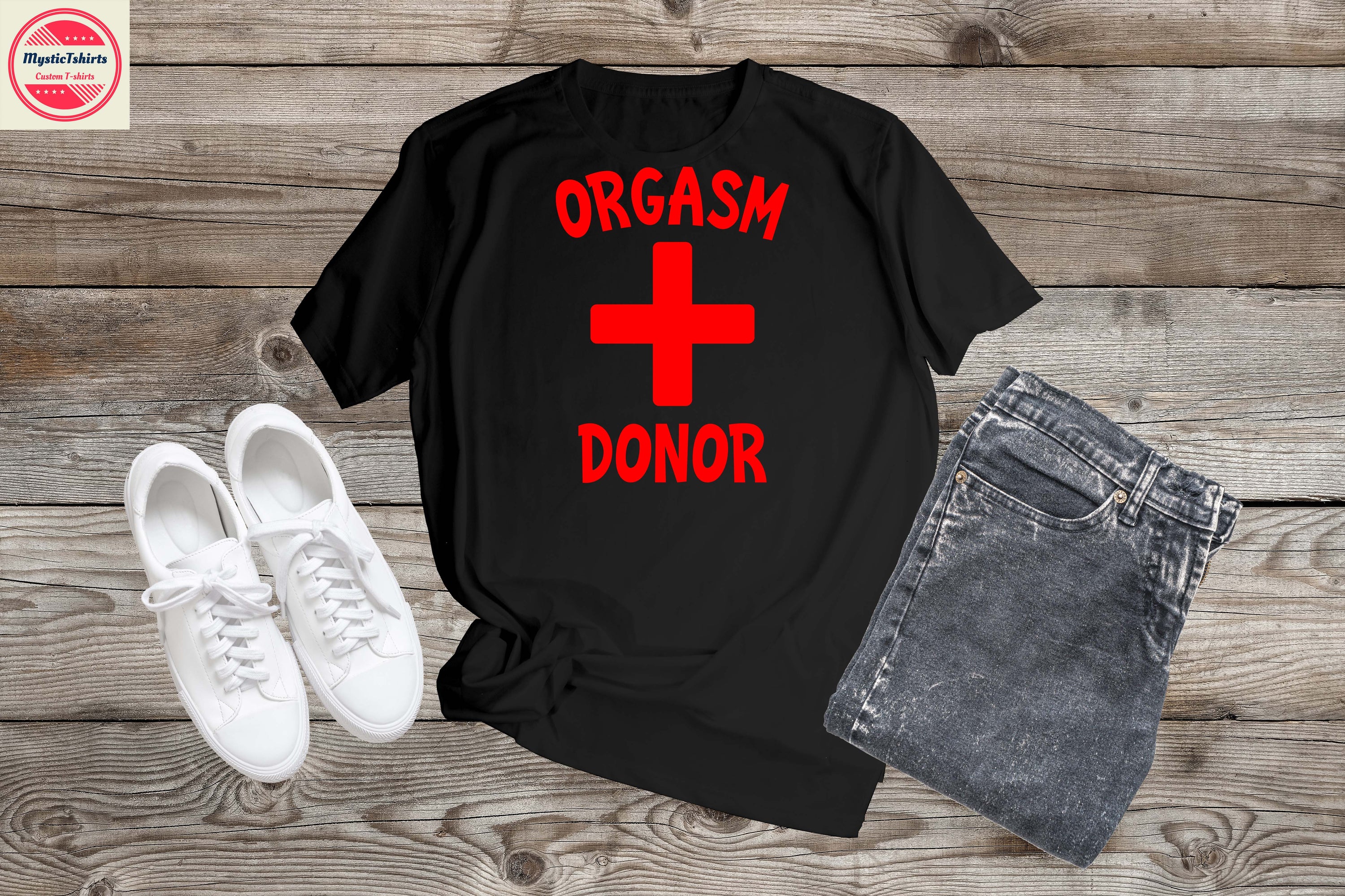 A personalized ORGASM DONOR T-Shirt featuring custom text, displayed on a mannequin with vibrant colors and high-quality fabric.