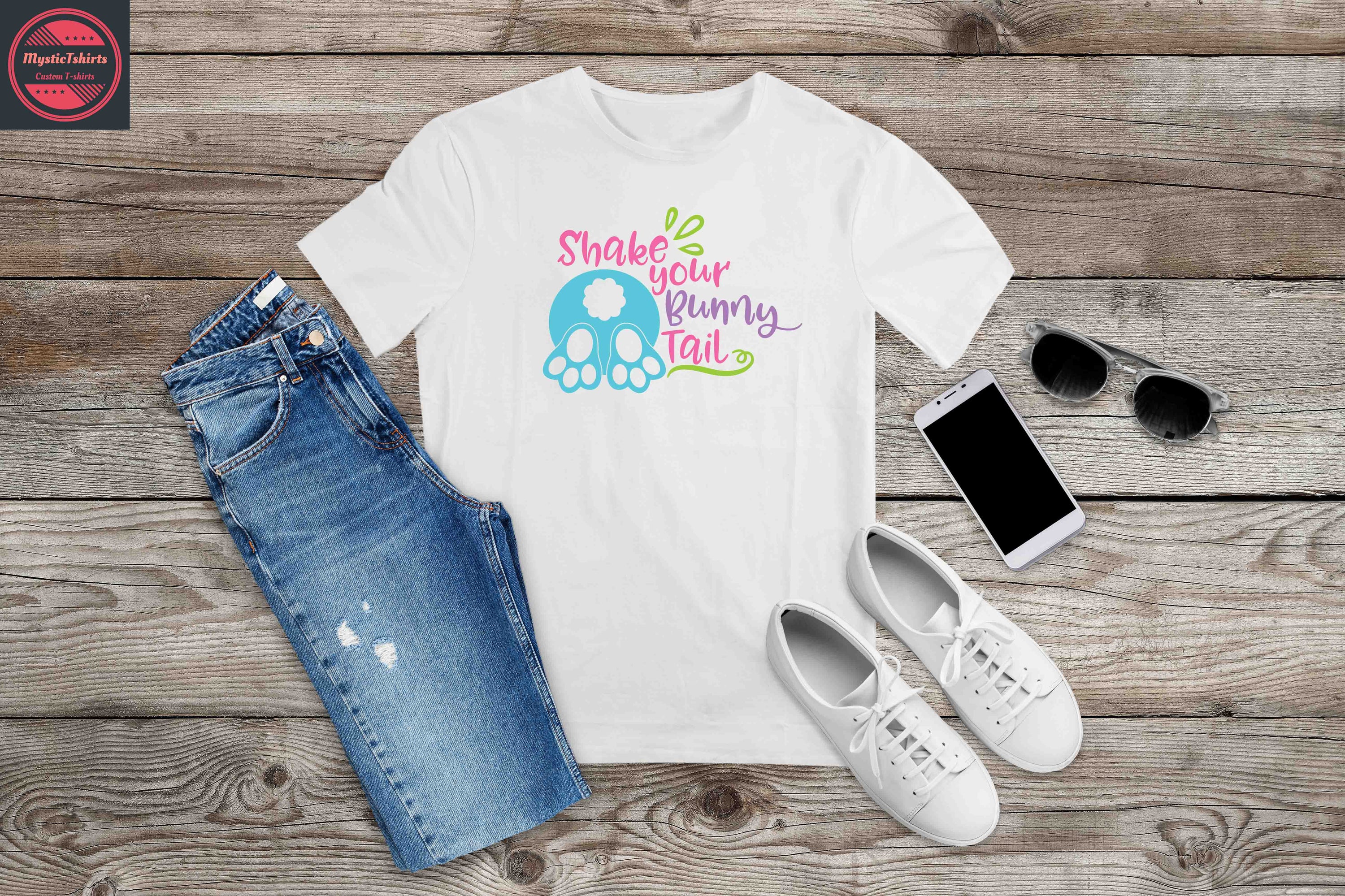 Custom made 'Shake Your Bunny Tale' T-shirt featuring vibrant colors and unique design, perfect for any occasion.