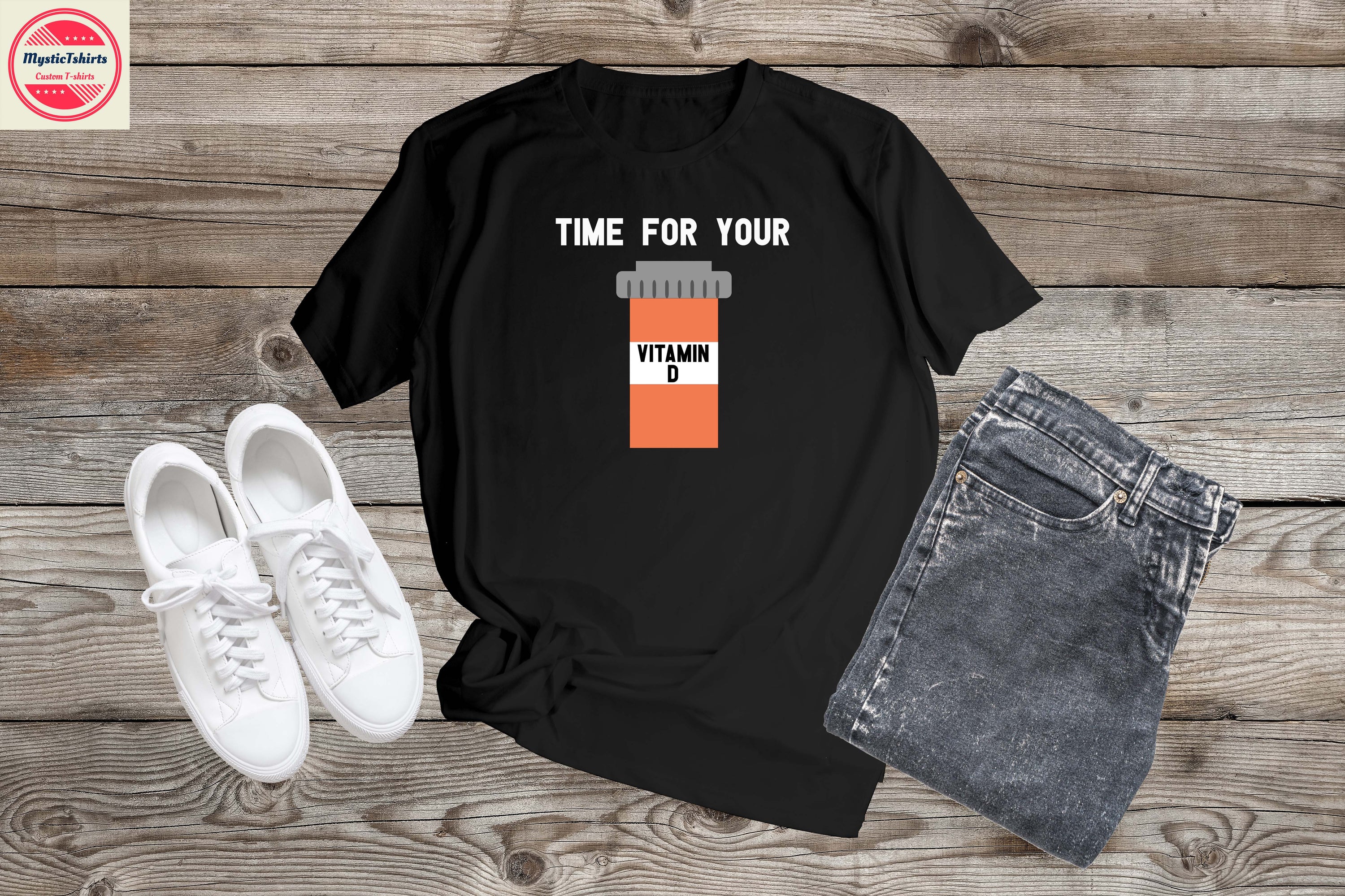 A personalized T-shirt featuring the phrase 'TIME FOR YOUR VITAMIN D' with custom text options, displayed in a vibrant color.