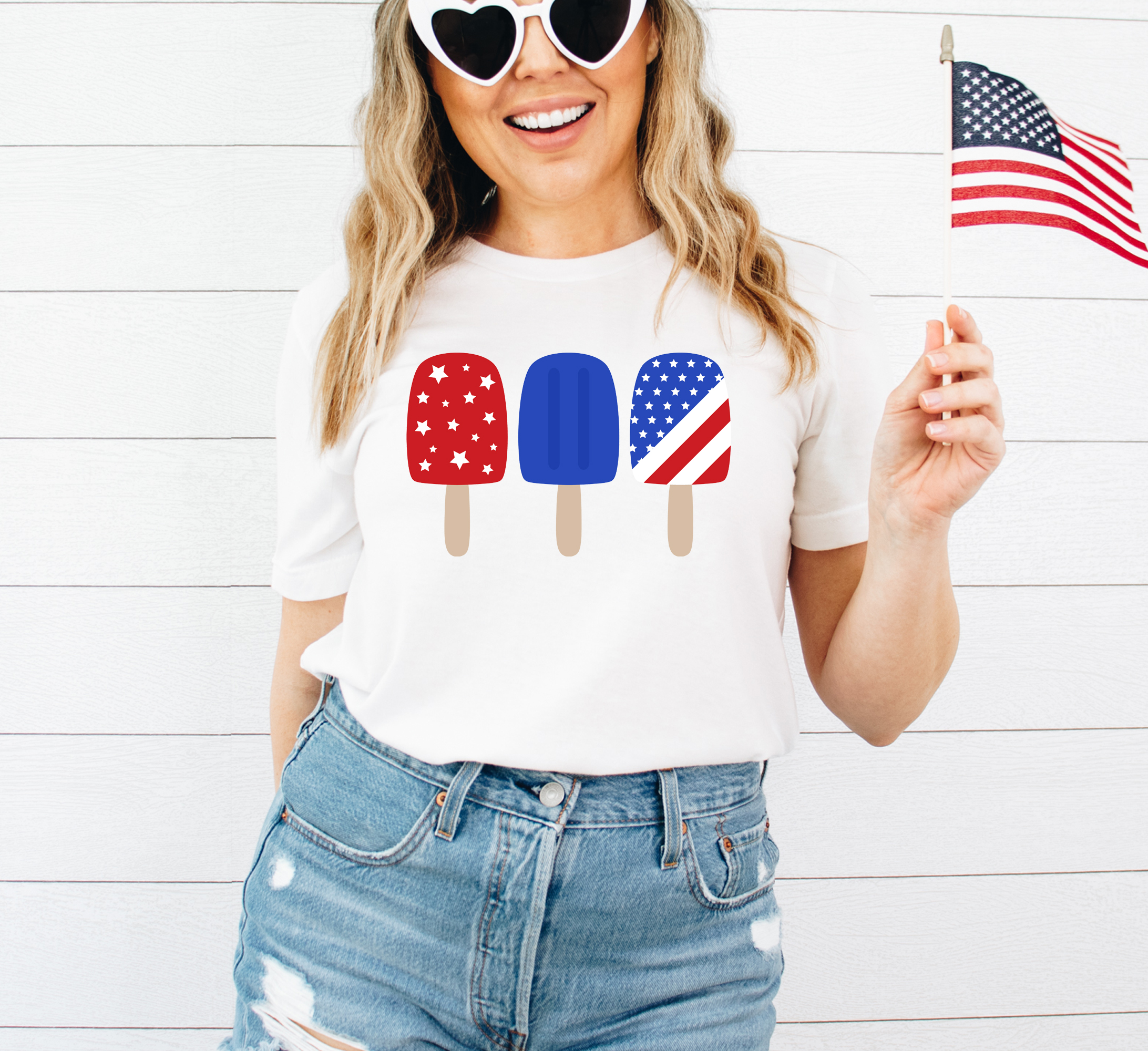 4th of July Popsicle T-shirt featuring a vibrant popsicle graphic on premium cotton fabric.